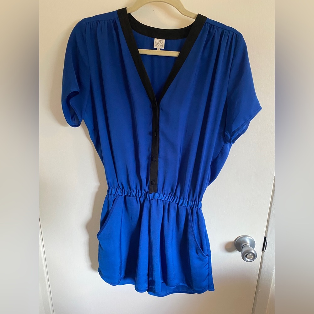 Chic romper from France! Only worn a couple of times. Gorgeous material.